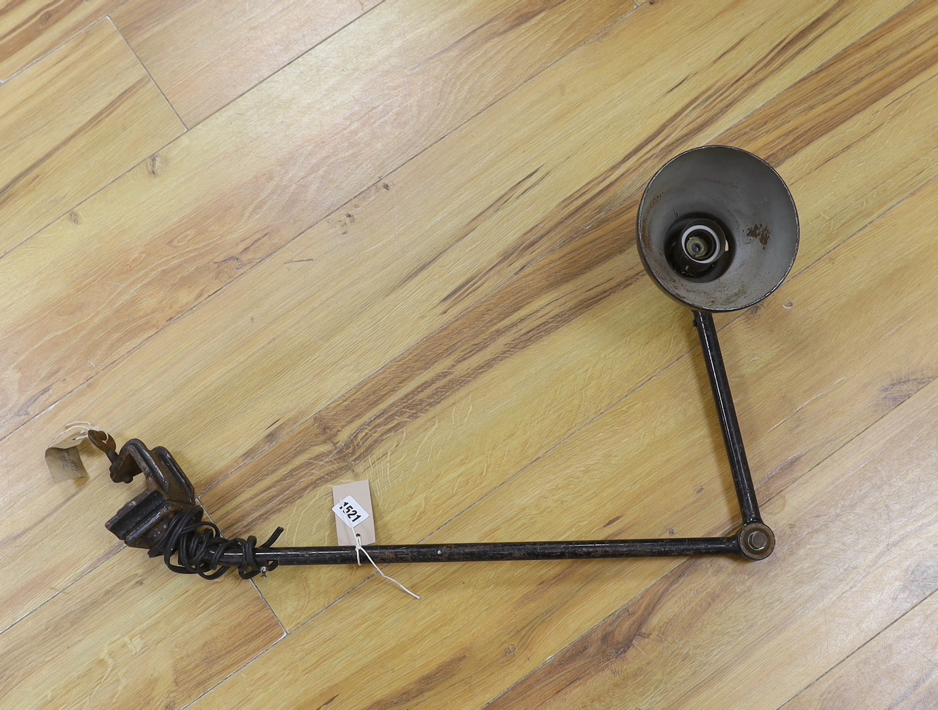 A Kandem model 802 adjustable lamp with clamp, 94cm high (fully extended)